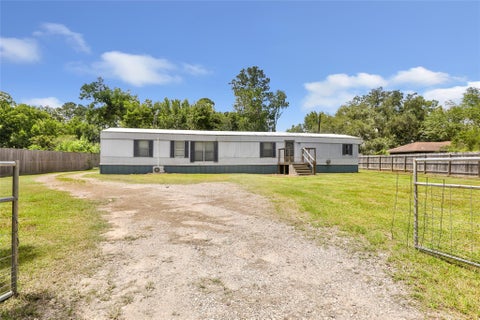 Photo of 104 W Lawrence Street, Dayton, TX 77535 (MLS # 76276867)