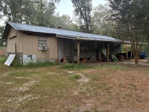 Photo of 27138 S Oak Creek Drive, Splendora, TX 77372 (MLS # 68940700)