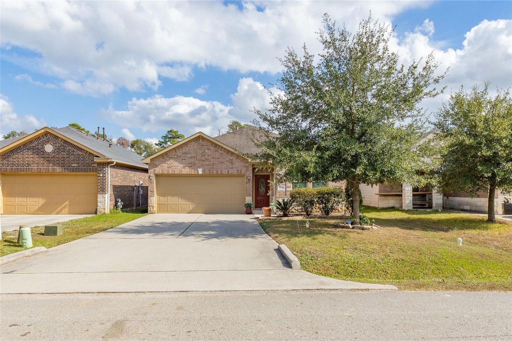 Photo of 23741 Briar Tree Drive, Porter, TX 77365 (MLS # 31972559)