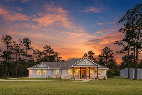 Photo of 10206 Heritage Ranch Road, Conroe, TX 77303 (MLS # 22966555)