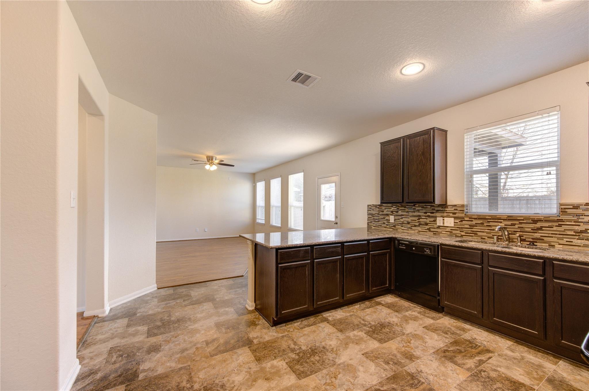 10907 Woodland Leaf Lane