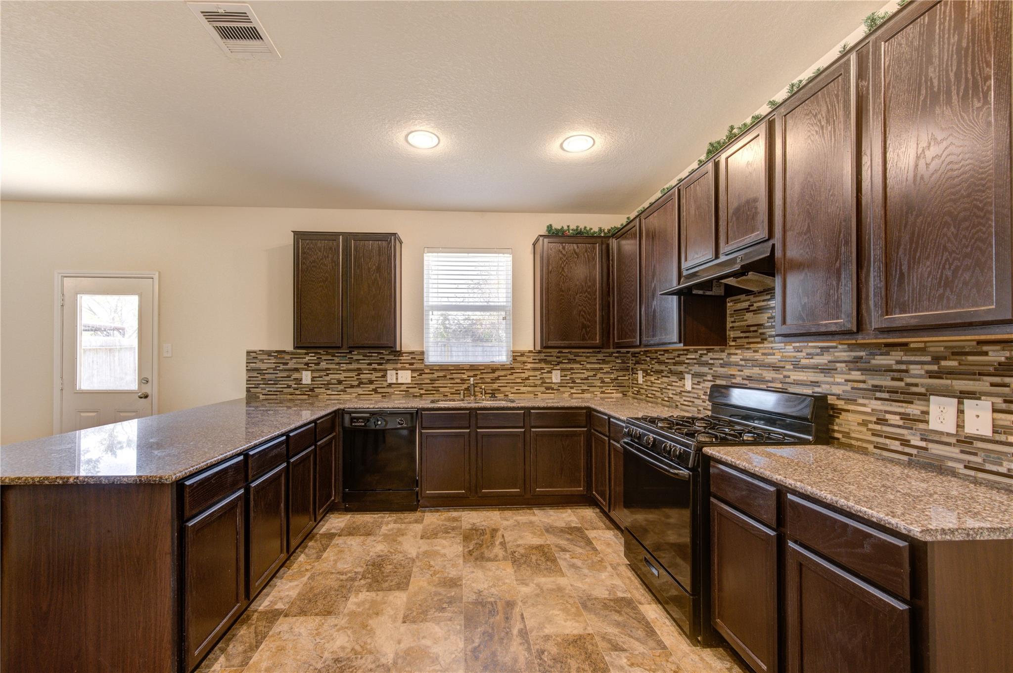 10907 Woodland Leaf Lane