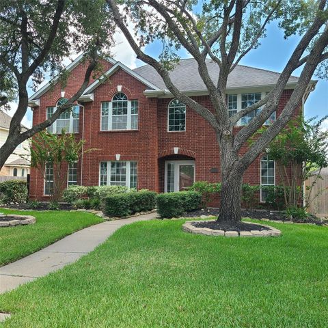 Photo of 611 Woodcastle Bend, Houston, TX 77094 (MLS # 88635766)