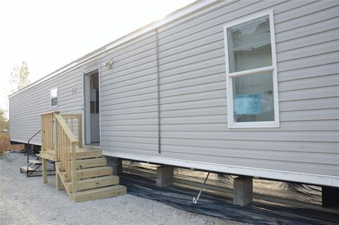 Photo of 725 County Road 5007, Cleveland, TX 77327 (MLS # 88045788)