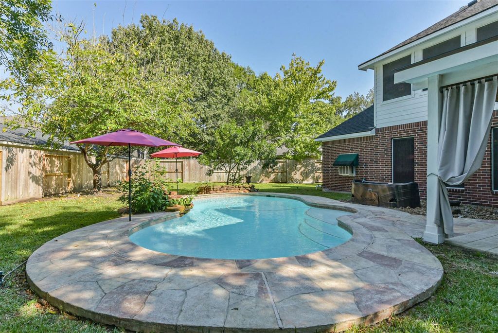 Photo of 12902 Chalfield Circle, Houston, TX 77044 (MLS # 54918362)