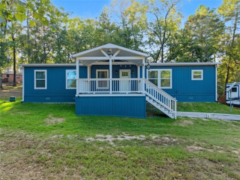 Photo of 551 Lone Oak Drive, Oakhurst, TX 77359 (MLS # 39743198)