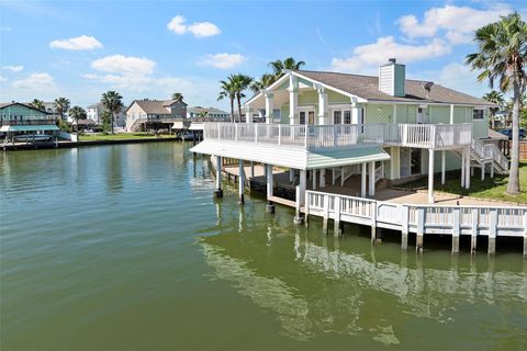 Photo of 1303 Coral Way Way, Tiki Island, TX 77554 (MLS # 56300947)