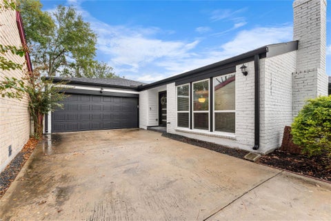 Photo of 11207 Wood Lodge Drive, Houston, TX 77077 (MLS # 91797401)