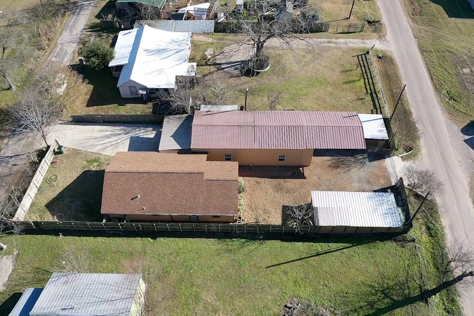 aerial of house and shop
