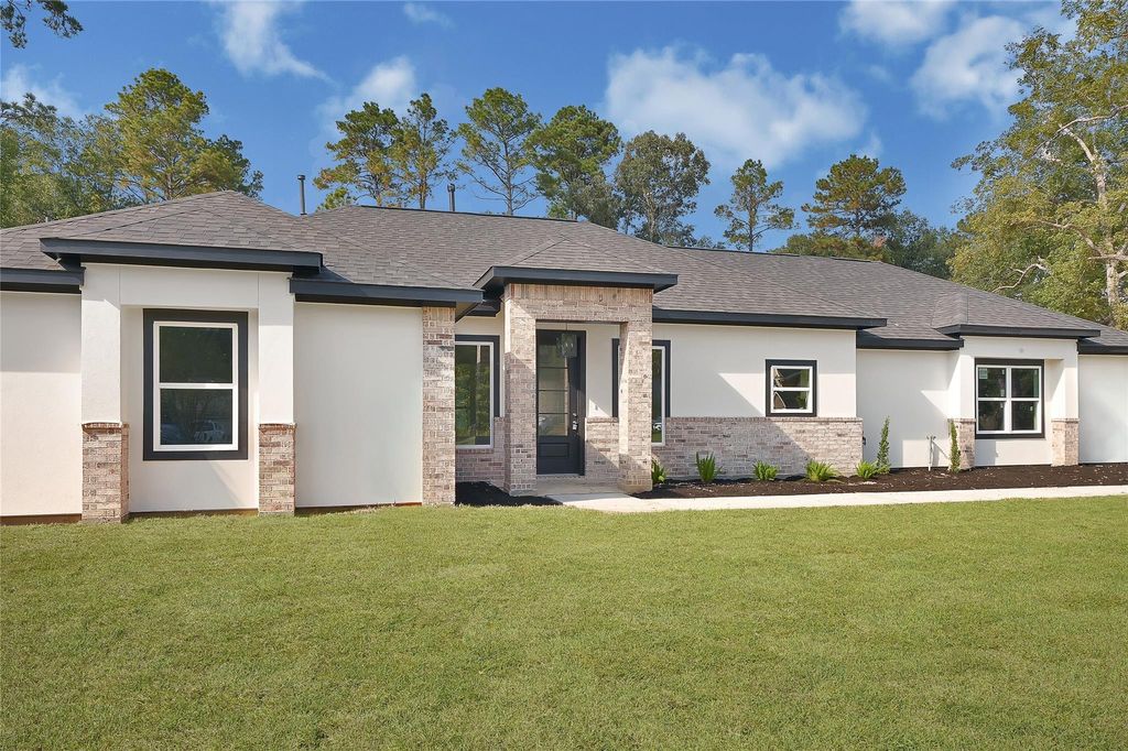 Photo of 2431 Forum Ct Ct, New Caney, TX 77357 (MLS # 98062276)