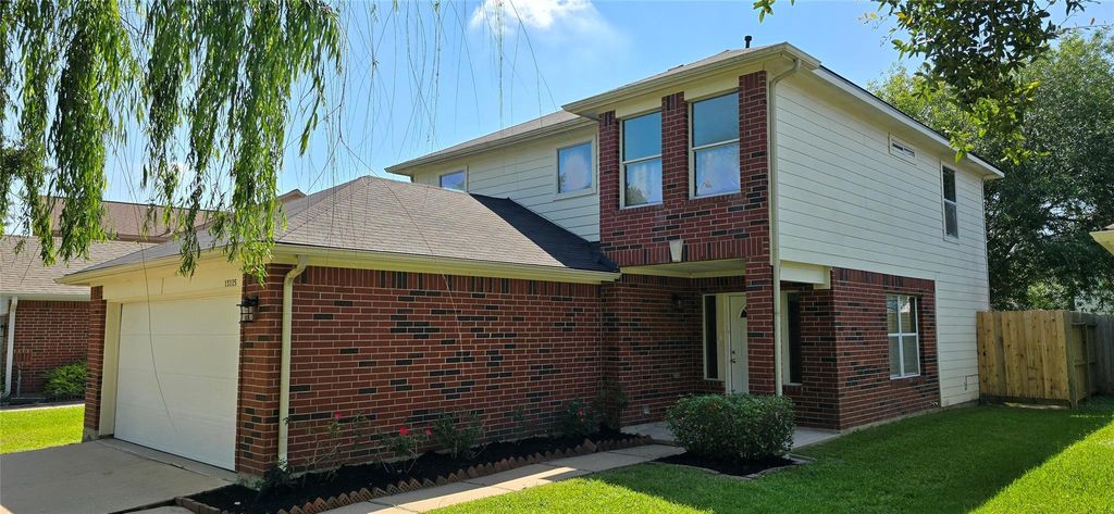 Photo of 13115 Ridgewood Knoll Lane, Houston, TX 77047 (MLS # 33164556)