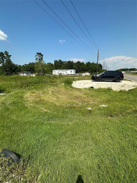 Photo of 319 County Road 3550, Cleveland, TX 77327 (MLS # 5916939)