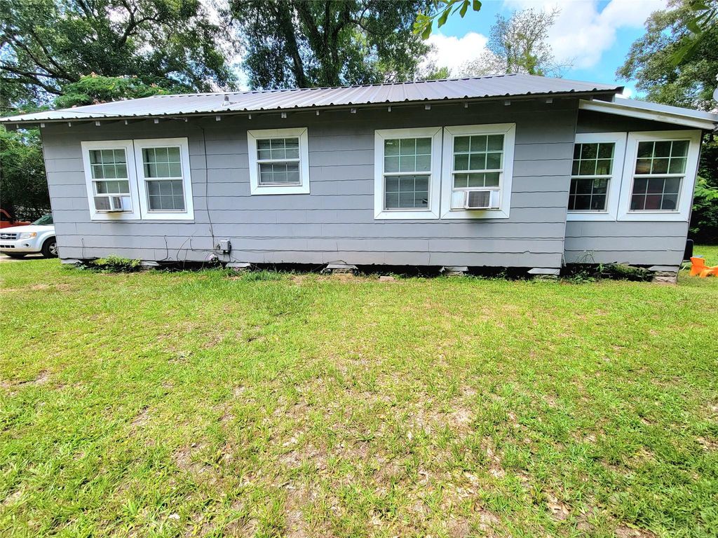 Photo of 107 Issacks Street, Cleveland, TX 77327 (MLS # 2852379)