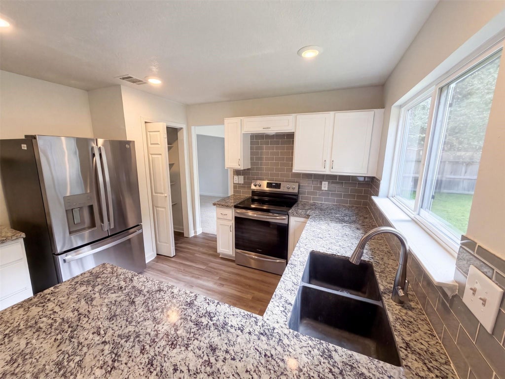 Photo of 3706 Ember Spring Drive, Houston, TX 77339 (MLS # 98749941)