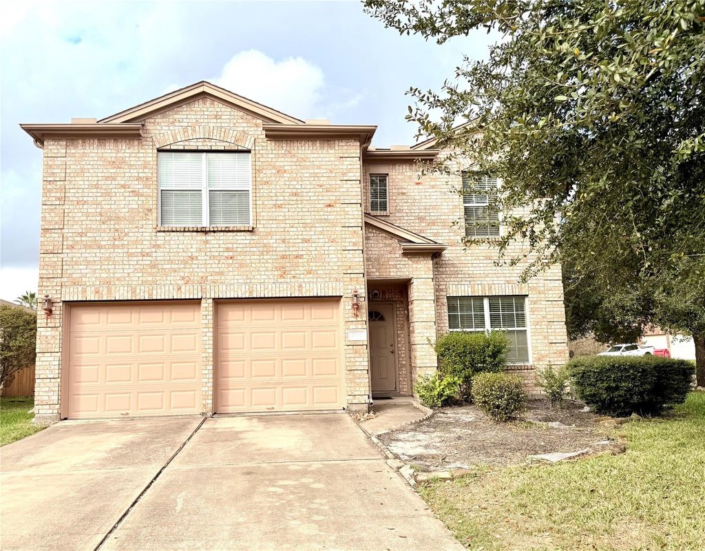 Photo of 4615 Pin Oak Creek Lane, Houston, TX 77345 (MLS # 54053054)