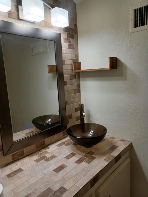 Tiny photo for 128 April Point Drive S, Conroe, TX 77356 (MLS # 32450212)