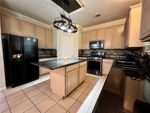 Photo of 202 Almond Drive, Baytown, TX 77520 (MLS # 87711743)
