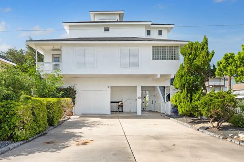 Photo of 1330 Coral Way, Tiki Island, TX 77554 (MLS # 38940782)