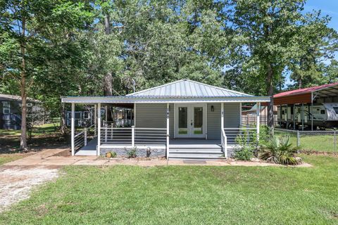 Photo of 140 Tobago Lane, Point Blank, TX 77364 (MLS # 65826824)
