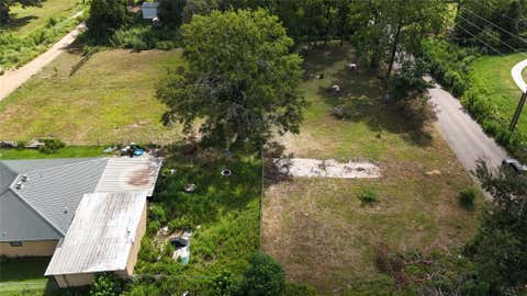Photo of 606 W Powell Street, Willis, TX 77378 (MLS # 28699760)