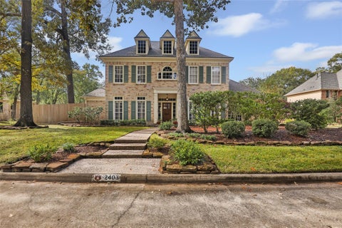 Photo of 2403 Kings Lodge Drive, Houston, TX 77345 (MLS # 86404697)