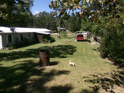 Photo of 71 S Lakeside Drive, Huntsville, TX 77320 (MLS # 2825274)