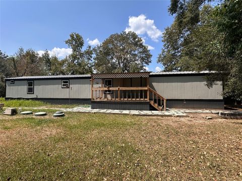 Photo of 196 County Road 337, Cleveland, TX 77327 (MLS # 82696222)
