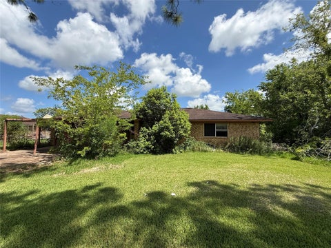 Photo of 409 County Road 243, Angleton, TX 77515 (MLS # 54236906)