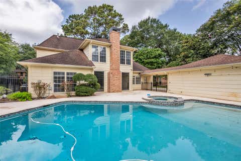 Photo of 14014 Court Of Regents, Houston, TX 77069 (MLS # 26337125)