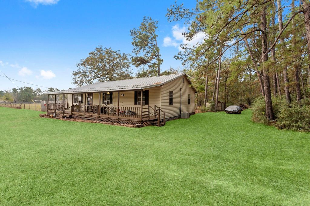 Photo of 11281 Clint Parker Road, Conroe, TX 77303 (MLS # 83472522)