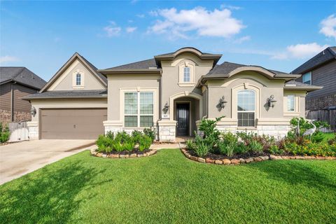 Photo of 915 Falcon Hollow Lane, Pinehurst, TX 77362 (MLS # 76647960)