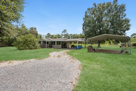 Photo of 9307 Fm 1130, Orange, TX 77632 (MLS # 28558170)