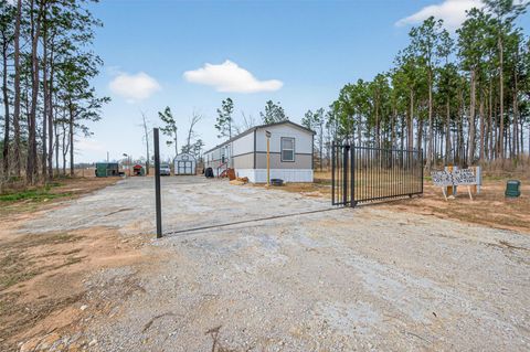 Photo of 617 Road 5896, Cleveland, TX 77327 (MLS # 28411816)