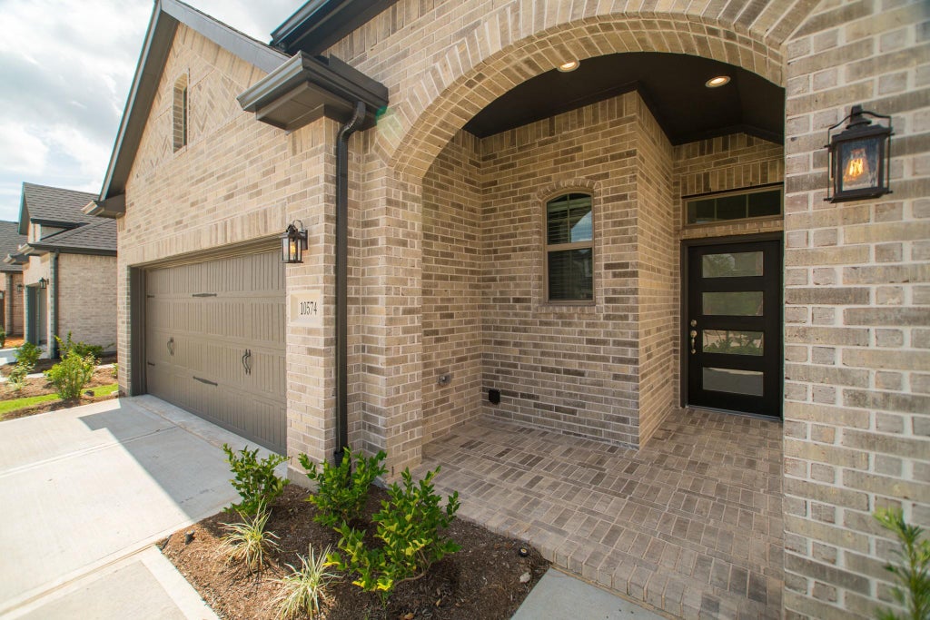 Photo of 10574 Wild Chives, Conroe, TX 77385 (MLS # 12870690)