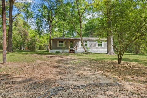 Photo of 13488 Enchanted Cove, Willis, TX 77318 (MLS # 34024669)