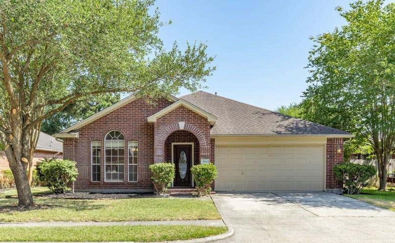 Photo of 21812 Whispering Forest Drive, Kingwood, TX 77339 (MLS # 33220905)