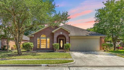 Photo of 21812 Whispering Forest Drive, Kingwood, TX 77339 (MLS # 33220905)