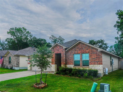 Photo of 332 Pecos Drive DR, Huntsville, TX 77340 (MLS # 33964566)