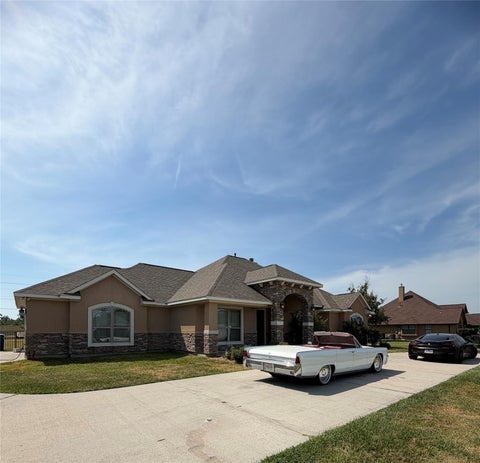 Photo of 8999 Water Point Drive, Beach City, TX 77523 (MLS # 81397275)