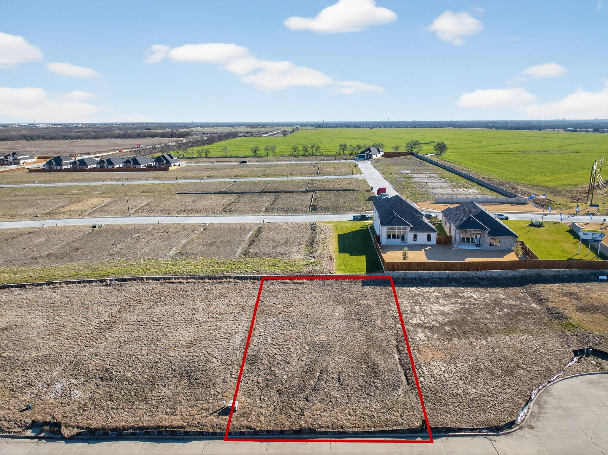 An aerial view featuring a digital boundary outline to showcase the impressive scale and 8,363 sq ft footprint of this residential parcel.