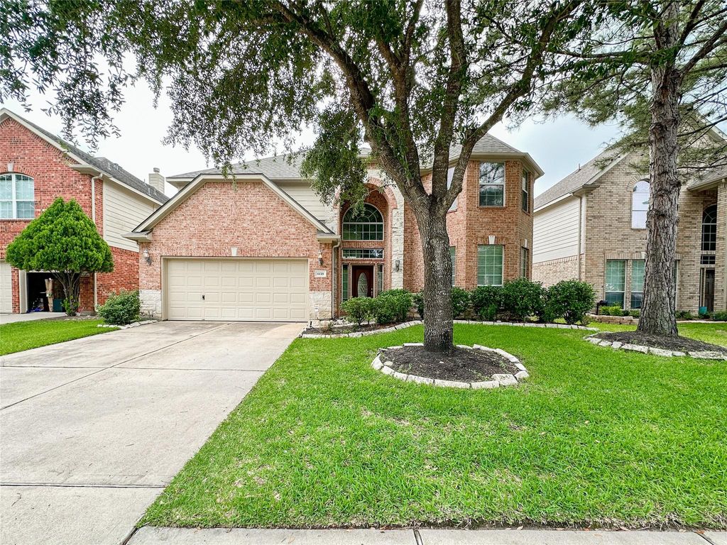 Photo of 6118 Coastal Grove Ln LN, Katy, TX 77494 (MLS # 85867545)
