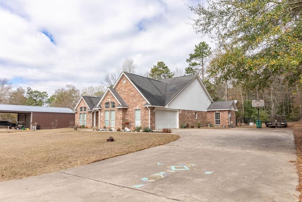 Photo of 318 Peppertree, Village Mills, TX 77663 (MLS # 82867820)