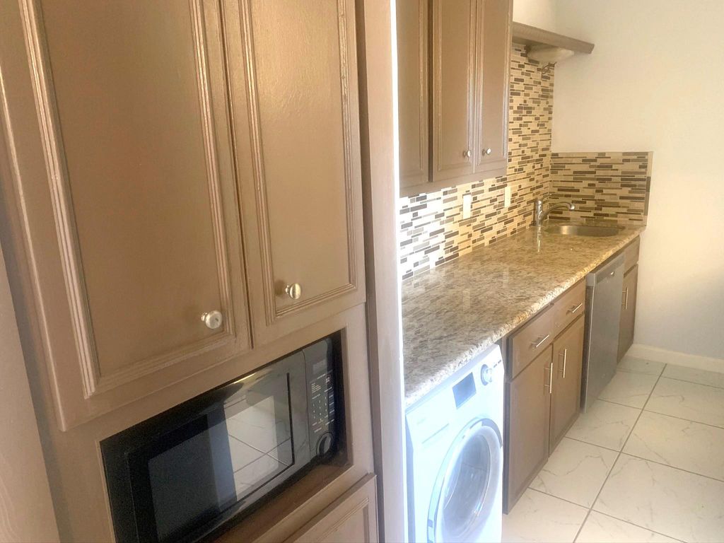 Photo of 5550 N Braeswood Boulevard #148, Houston, TX 77096 (MLS # 10888110)