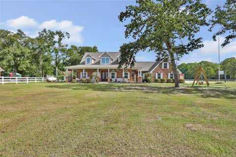 Photo of 1111 Valley Commons Drive, Huffman, TX 77336 (MLS # 22986799)