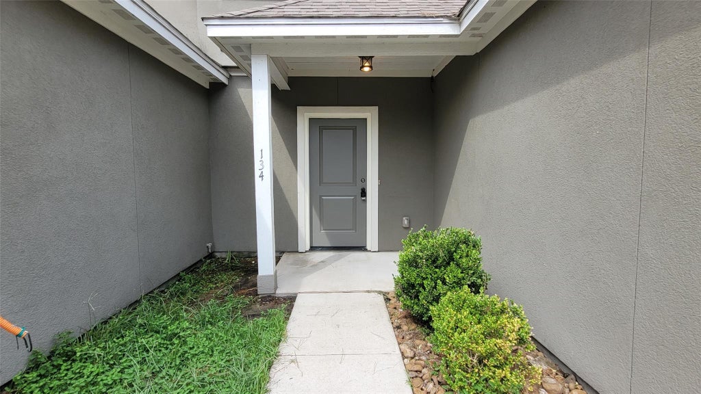 Photo of 134 Artesian Way, Roman Forest, TX 77357 (MLS # 91380003)