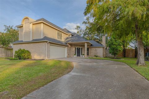 Photo of 9810 Jockey Club Drive, Houston, TX 77065 (MLS # 49903564)
