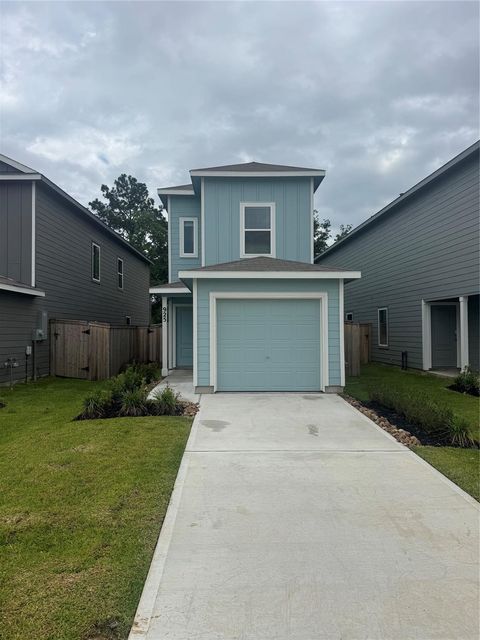 Photo of 925 Pertuso Lane, Huffman, TX 77336 (MLS # 65946909)