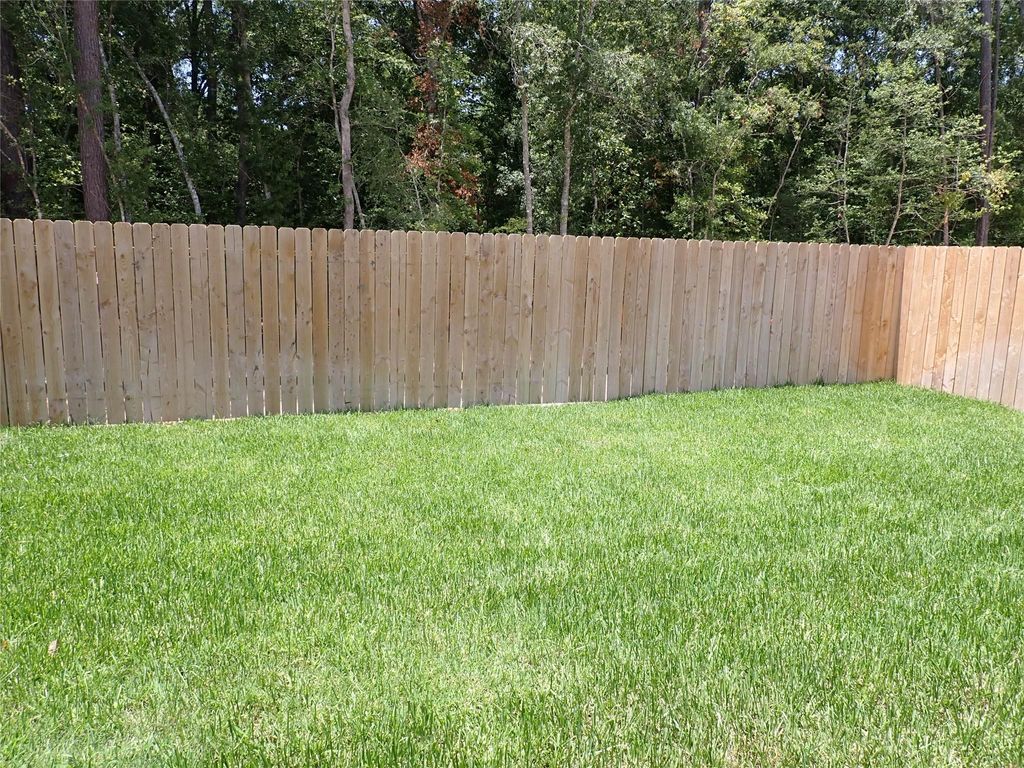 Photo of 14962 Cypress Hollow Drivee Dr, New Caney, TX 77357 (MLS # 47224050)