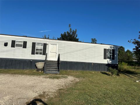 Photo of 302 County Road 51022, Cleveland, TX 77327 (MLS # 80066580)