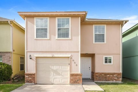 Photo of 4955 N Cancun Drive, Houston, TX 77045 (MLS # 91429040)